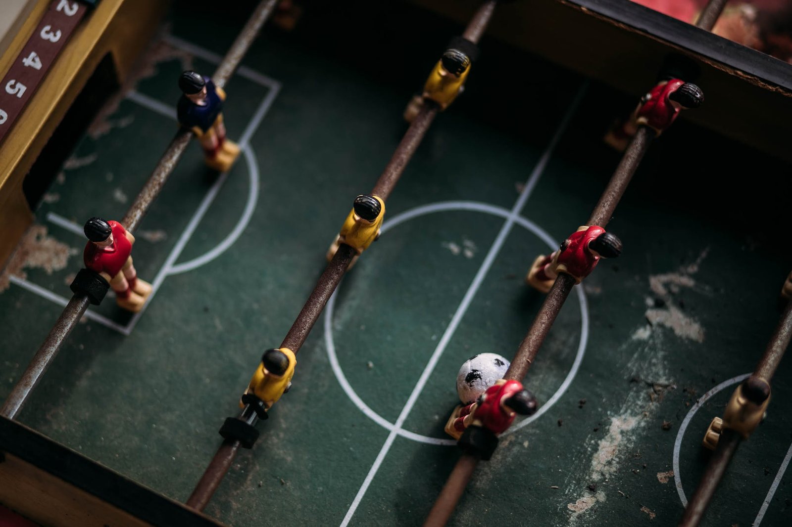 close up and top photography of football table